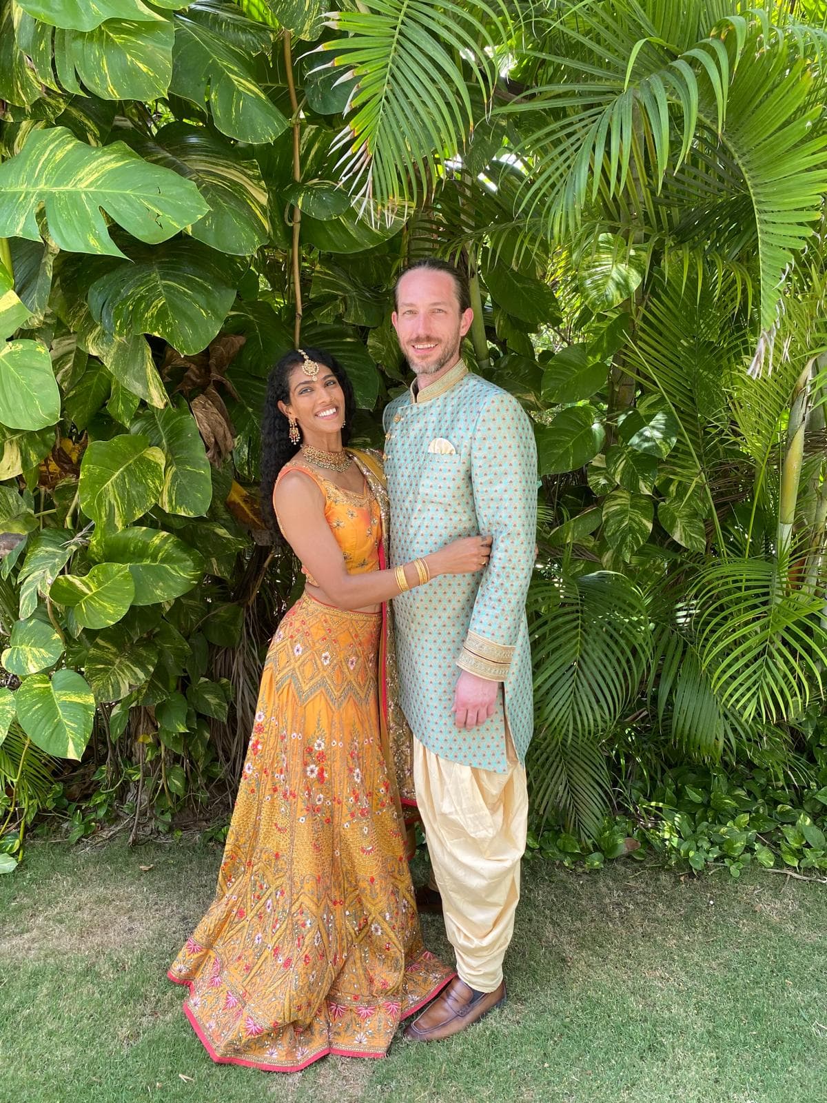 Vinita and Nathaniel in traditional wedding attire